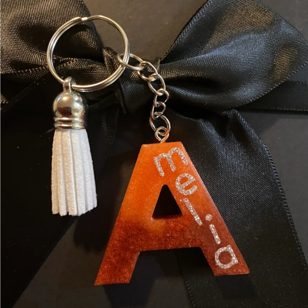Orange, brawn Initial Keyring with Tassel